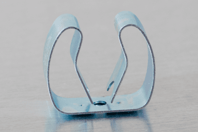 close up of a spring steel gripper clip, tool clip, durable, secure holding, Excellent corrosion and wear resistance, good outdoor weather resistance, mounting hole, made in the usa, silver zinc chromate, 00050198000023 